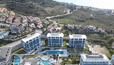 Стильный дуплекс 2+1 с мебелью в районе Каргыджак