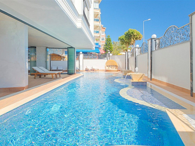 Уютная квартира 1+1 с мебелью на первой береговой линии в центре Алании