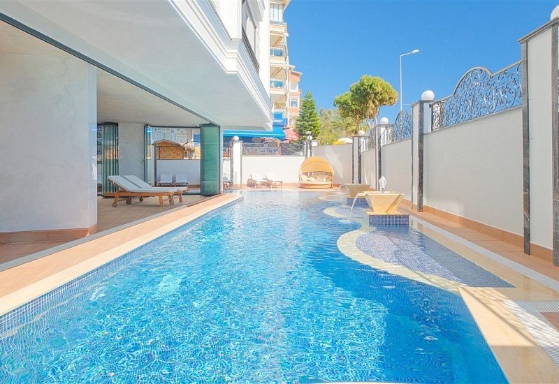 Уютная квартира 1+1 с мебелью на первой береговой линии в центре Алании