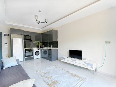 Новые апартаменты 1+1 с мебелью - район Махмутлар
