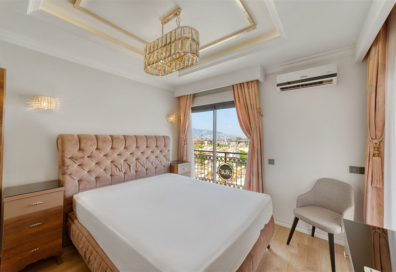 Апартаменты 3+1 с мебелью в одном из престижных комплексов с видом на море в центре Алании