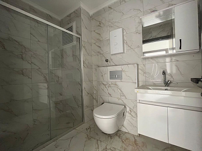 Готовые апартаменты 2+1 в районе Махмутлар всего в 250 метрах от моря