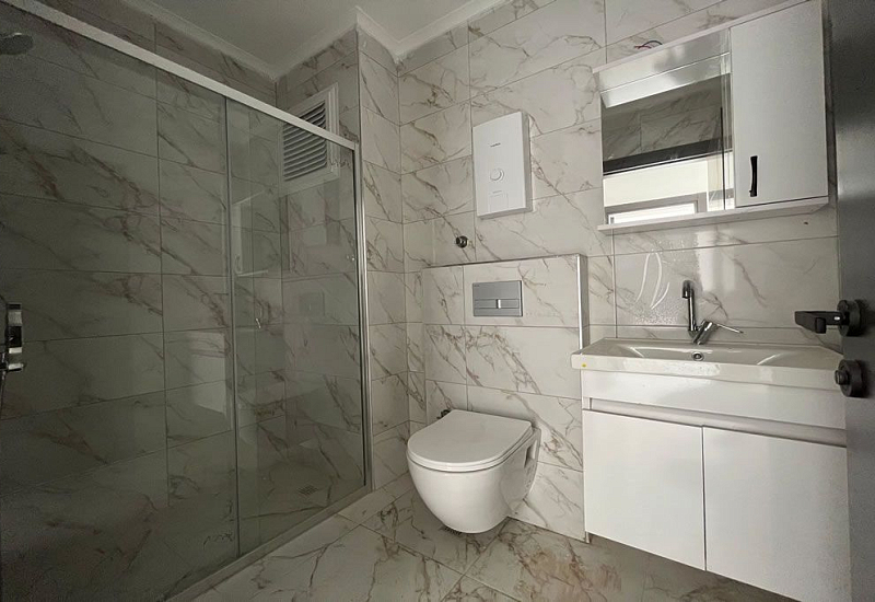 Готовые апартаменты 2+1 в районе Махмутлар всего в 250 метрах от моря