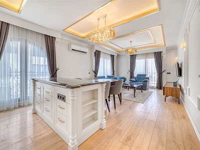 Апартаменты 3+1 с мебелью в одном из престижных комплексов с видом на море в центре Алании