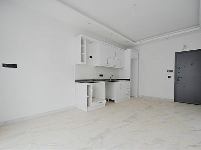 Новые апартаменты 1+1 в живописном районе Алании - Авсаллар