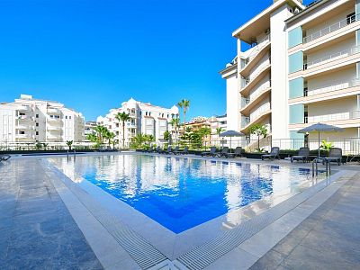 Апартаменты 1+1 с мебелью на первой береговой линии в районе Тосмур