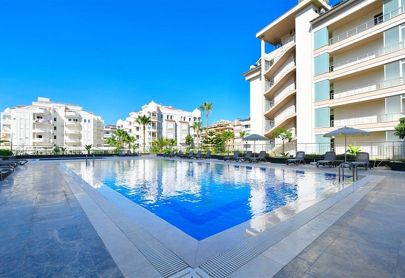 Апартаменты 1+1 с мебелью на первой береговой линии в районе Тосмур