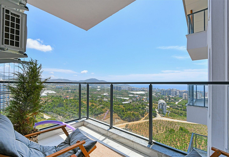 Стильная квартира 1+1 с мебелью и видом на море в районе Махмутлар