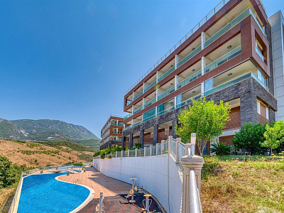 Стильный меблированный лофт 1+1 с собственным садом в районе Каргыджак