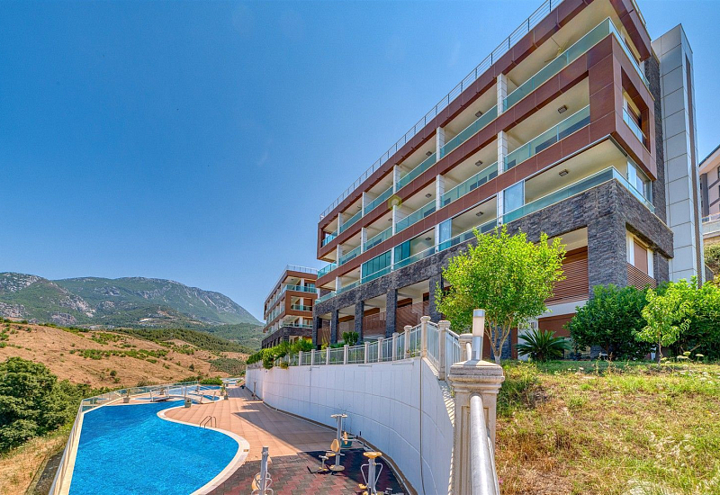 Стильный меблированный лофт 1+1 с собственным садом в районе Каргыджак