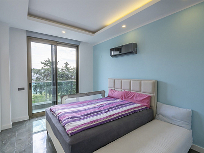 Стильная квартира 3+1 с мебелью, большим балконом и видом на море в районе Кестель