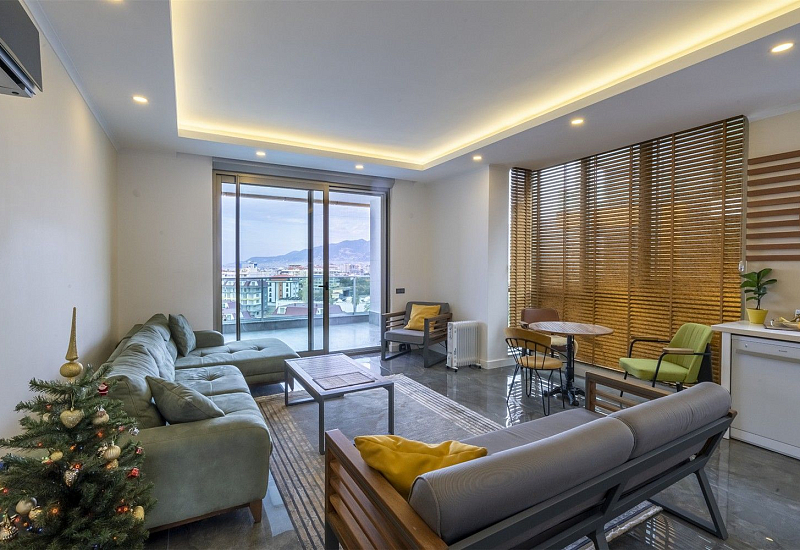 Стильная квартира 3+1 с мебелью, большим балконом и видом на море в районе Кестель