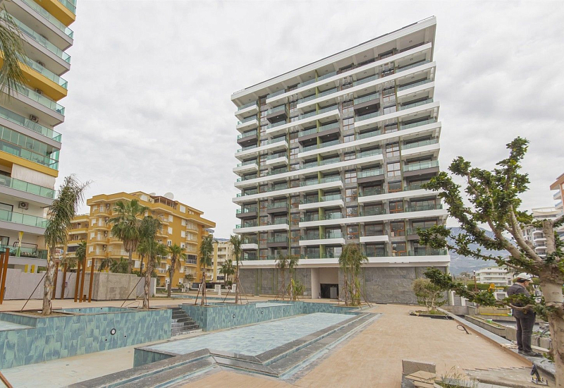 Апартаменты 2+1 с панорамными окнами и видом на море в районе Махмутлар