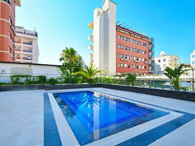 Меблированная квартира 1+1 с видом на море в районе Тосмур