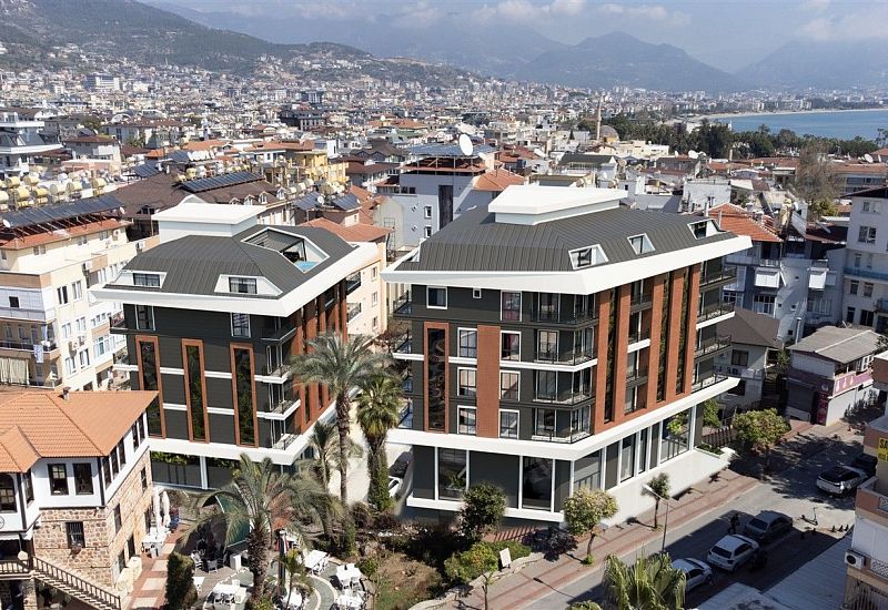 Современный жилой проект в центре Алании с удобными планировками 1+1, 2+1 и 3+1