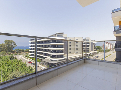 Готовые апартаменты 1+1 с мебелью и видом на море в районе Каргыджак