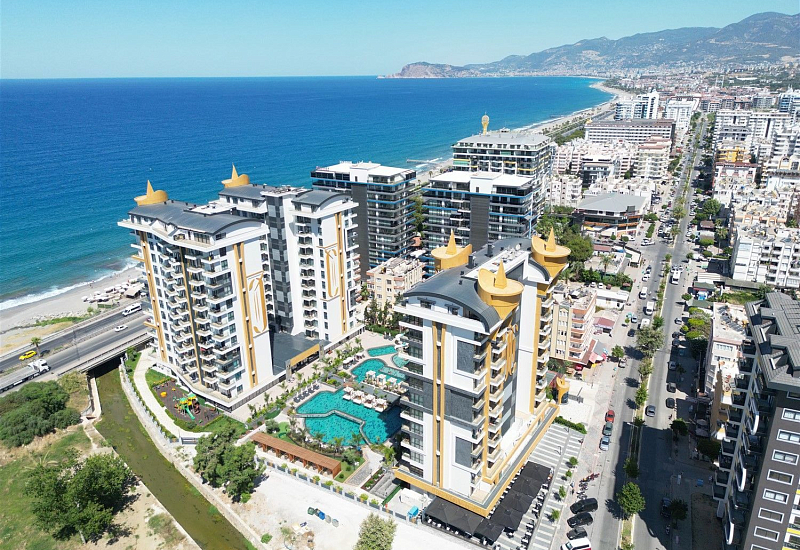 Светлые апартаменты 1+1 с видом на море в Махмутларе