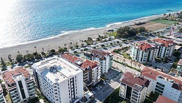 Меблированная квартира 2+1 с видом на море и бассейн в районе Кестель