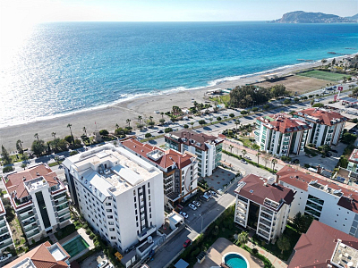 Меблированная квартира 2+1 с видом на море и бассейн в районе Кестель