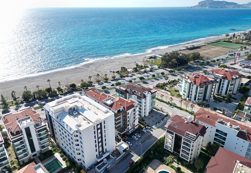 Меблированная квартира 2+1 с видом на море и бассейн в районе Кестель