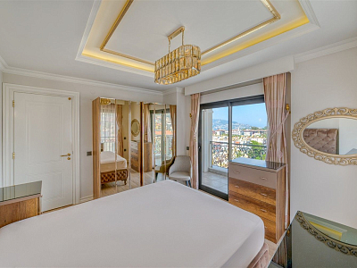 Апартаменты 3+1 с мебелью в одном из престижных комплексов с видом на море в центре Алании