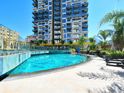 Апартаменты 1+1 на первой береговой линии в районе Махмутлар