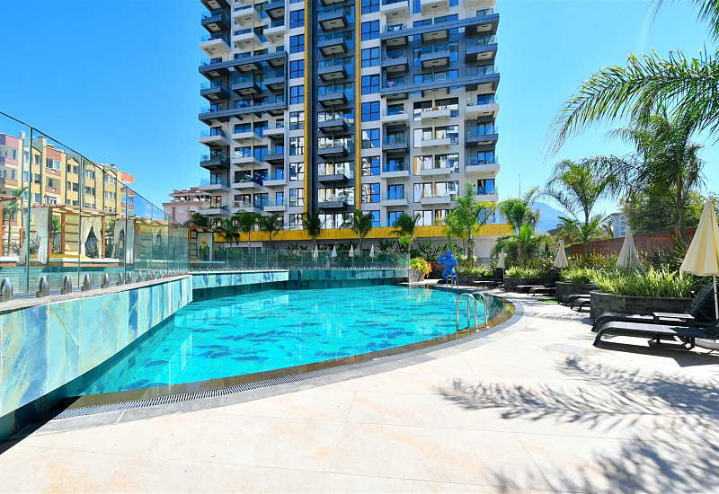 Апартаменты 1+1 на первой береговой линии в районе Махмутлар