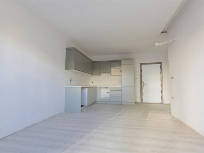 Готовые апартаменты 1+1 в популярном районе Махмутлар