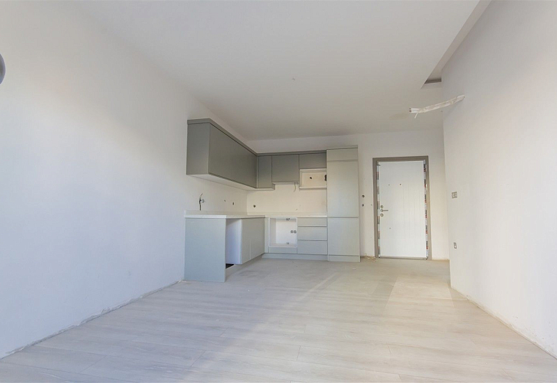 Готовые апартаменты 1+1 в популярном районе Махмутлар