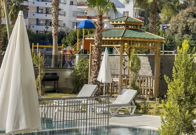 Апартаменты 1+1 с видом на бассейн в районе Авсаллар