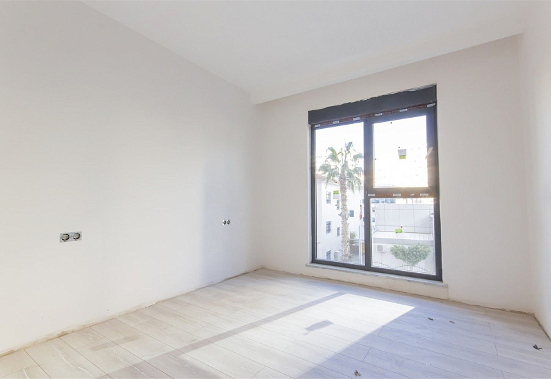 Готовые апартаменты 1+1 в популярном районе Махмутлар