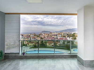 Стильная квартира 3+1 с мебелью, большим балконом и видом на море в районе Кестель