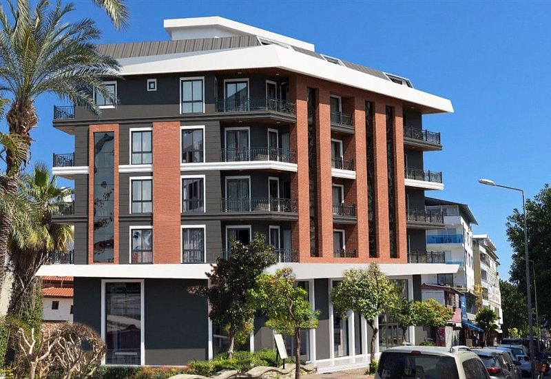 Современный жилой проект в центре Алании с удобными планировками 1+1, 2+1 и 3+1