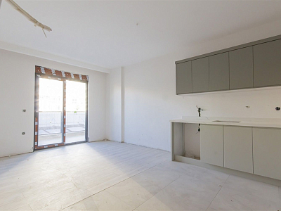 Готовые апартаменты 1+1 в популярном районе Махмутлар