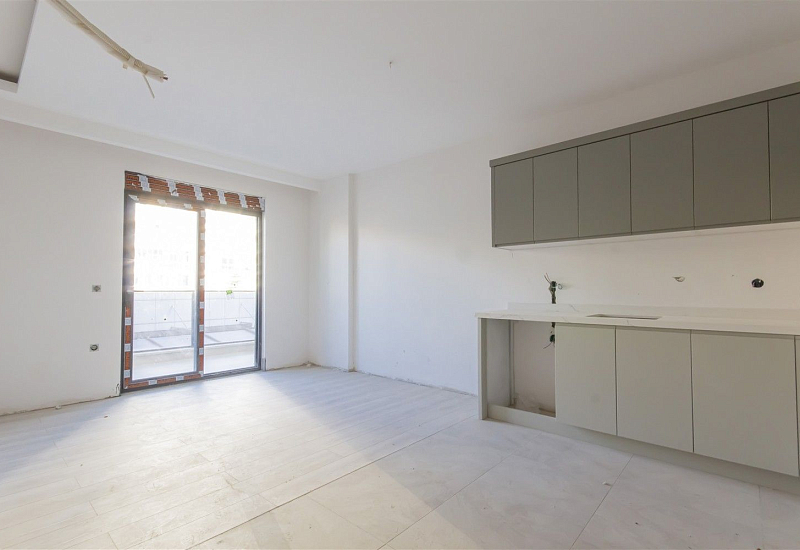 Готовые апартаменты 1+1 в популярном районе Махмутлар