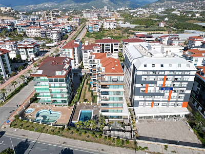 Меблированная квартира 2+1 с видом на море и бассейн в районе Кестель