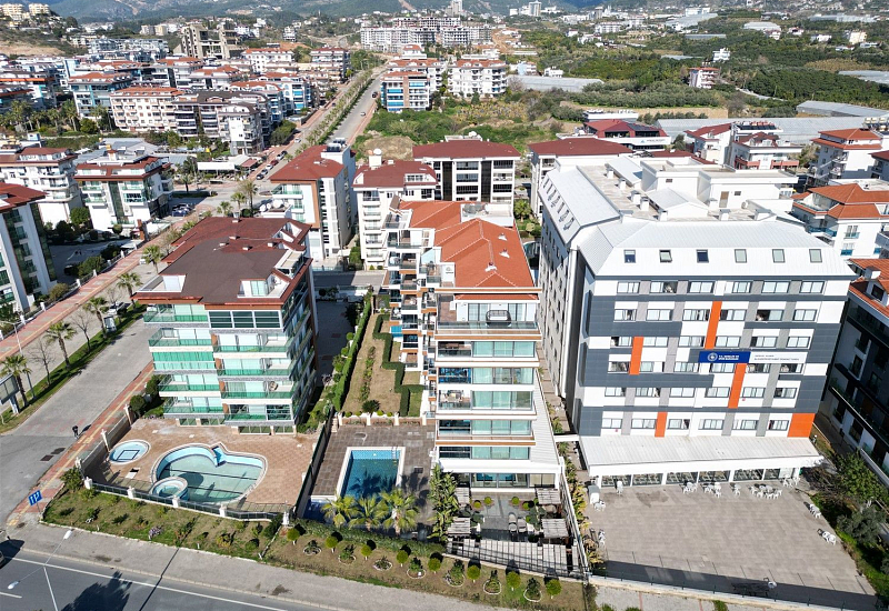 Меблированная квартира 2+1 с видом на море и бассейн в районе Кестель