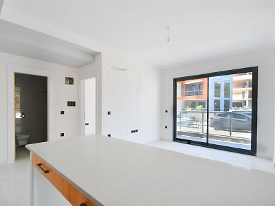 Новые апартаменты 1+1 в новостройке - живописный район Авсаллар