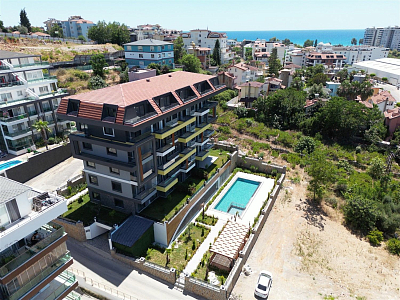 Готовая квартира 1+1 с видом на бассейн и на горы в Кестеле