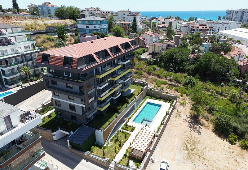 Готовая квартира 1+1 с видом на бассейн и на горы в Кестеле