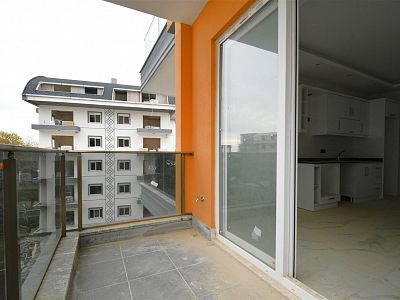 Новые апартаменты 1+1 в живописном районе Алании - Авсаллар