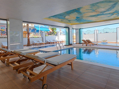 Уютная квартира 1+1 с мебелью на первой береговой линии в центре Алании