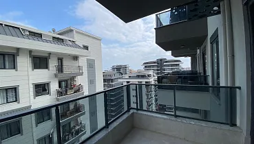 Стильная квартира 1+1 в районе Махмутлар