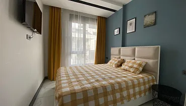 Стильная квартира 1+1 в районе Махмутлар