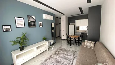 Стильная квартира 1+1 в районе Махмутлар